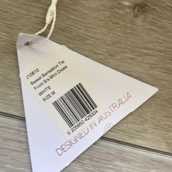 LOVE TRIANGLE
SWEET SENSATION TIE FRONT S/S MINI DRESS WHITE M NWT - Picture 6 of 8